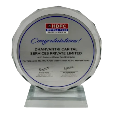 Dhanvantree – mutual fund distributor in Delhi awarded by HDFC Mutual Fund AMC for achieving ₹100 Cr AUM milestone in financial services.