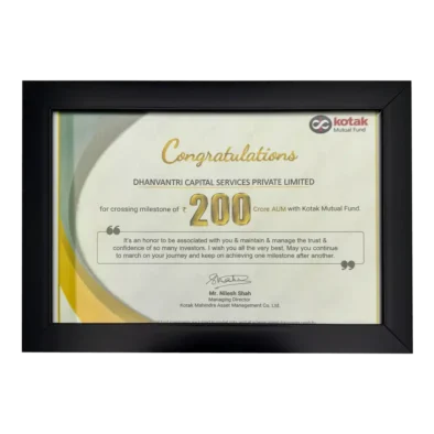 Dhanvantree – mutual fund distributor in Delhi awarded by Kotak Mutual Fund AMC for achieving ₹200 Cr AUM milestone in financial services.
