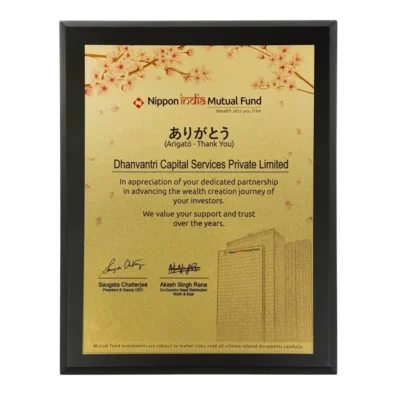 Dhanvantri Capital Services Pvt Ltd received an award from Nippon India Mutual Fund AMC for outstanding performance in financial services.